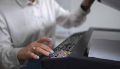 woman-work-office-using-printer